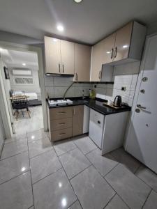 Kuchyň nebo kuchyňský kout v ubytování JOE BLACK APART + 39 fotografií