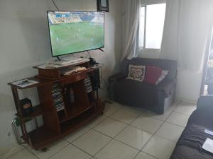 Et tv og/eller underholdning på Casa no Bosque Felizcidade