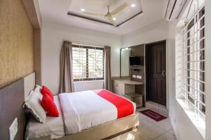 Ένα ή περισσότερα κρεβάτια σε δωμάτιο στο Hotel O Eagle Fantasy