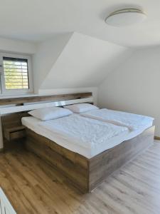 Ένα ή περισσότερα κρεβάτια σε δωμάτιο στο Milíkov 41