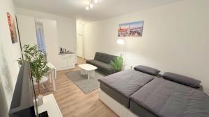 Posezení v ubytování Modern, quiet apartment right by S-Bahn - close to Munich & airport
