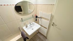 Koupelna v ubytování Modern, quiet apartment right by S-Bahn - close to Munich & airport