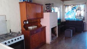 Η κουζίνα ή μικρή κουζίνα στο Mar apartamento +6 φωτογραφίες