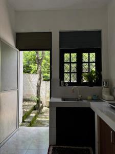 Η κουζίνα ή μικρή κουζίνα στο The Colombo House