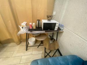 Et tv og/eller underholdning på شاليه كاسا بيرلا - Casa Pearla + 9 billeder