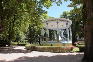 a gazebo in the middle of a park at Maison avec Jardin 3 chambres entre Tarn et Aveyron in Carmaux +26 photos