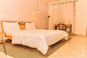 Ένα ή περισσότερα κρεβάτια σε δωμάτιο στο Village Nong Taaba