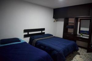 Acogedor estudio cerca del centro tesisinde bir odada yatak veya yataklar +43 fotoğraf