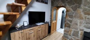 Μια τηλεόραση ή/και κέντρο ψυχαγωγίας στο Árnyas Tölgy +5 φωτογραφίες