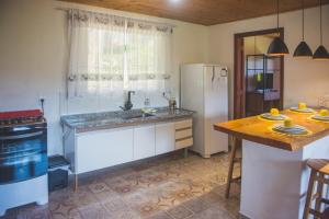 Kuchyň nebo kuchyňský kout v ubytování Casa na montanha + 42 fotografií