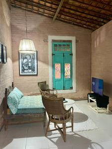 Et tv og/eller underholdning på Casa maravilhosa Olinda