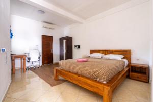 Ένα ή περισσότερα κρεβάτια σε δωμάτιο στο Amed Sari Beach Guesthouse