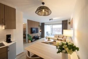 Kuchyň nebo kuchyňský kout v ubytování Appartement met zwembad in Neoportus Nieuwpoort