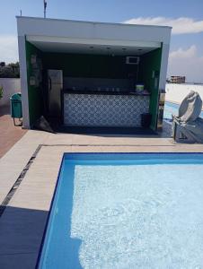 Swimmingpoolen hos eller tæt på Hospedagem para grupos