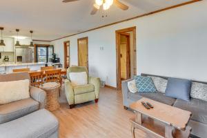 a living room with a couch and chairs and a table at Private Lakefront Home with Views and Dock in Hartwell in Reed Creek