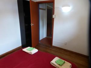 Ένα ή περισσότερα κρεβάτια σε δωμάτιο στο Dragon's den