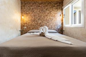 Ένα ή περισσότερα κρεβάτια σε δωμάτιο στο Tropea Solemare +209 φωτογραφίες