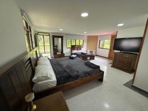 Postel nebo postele na pokoji v ubytování Finca Jamaica