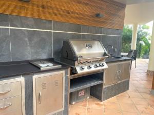 a grill on a counter in a kitchen at Beachhouse 2min to the sea with pool & wonderful garden in Calvia Town