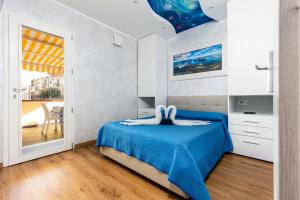 Ένα ή περισσότερα κρεβάτια σε δωμάτιο στο Tropea Solemare