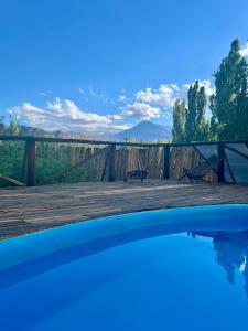 a swimming pool with a view of the mountains at Terrazas de Uspallata in Uspallata