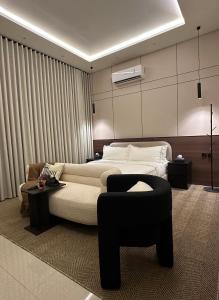 Ένα ή περισσότερα κρεβάτια σε δωμάτιο στο البروفيسور