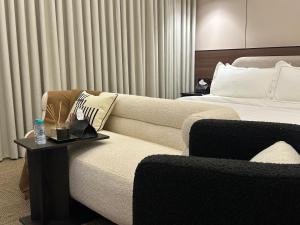 Ένα ή περισσότερα κρεβάτια σε δωμάτιο στο البروفيسور +8 φωτογραφίες