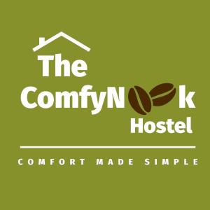 a logo for the ck hospital with a house at The ComfyNook Hostel 