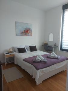 Ένα ή περισσότερα κρεβάτια σε δωμάτιο στο Kilenc Danube District 8