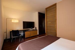 Giường trong phòng chung tại Mercure Bogota BH Retiro +33 ảnh