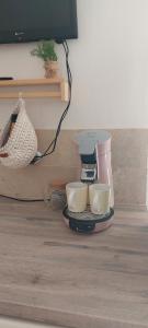 Μια τηλεόραση ή/και κέντρο ψυχαγωγίας στο Suite Annexe Villa Simple Abri