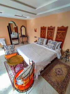 Ένα ή περισσότερα κρεβάτια σε δωμάτιο στο Fez Room - Traditional Moroccan Style