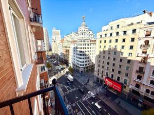 a view of a street in a city with buildings at Mucho Madrid in Madrid