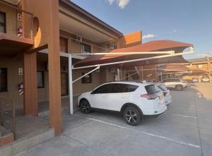 Bygningen som lejligheden ligger i + 3 billeder