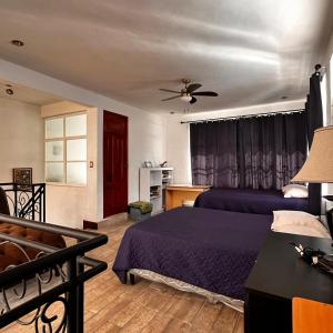 Ένα ή περισσότερα κρεβάτια σε δωμάτιο στο Casa Dunn by Don Pascual