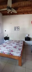 Ένα ή περισσότερα κρεβάτια σε δωμάτιο στο Peumayen Nueva Atlantis