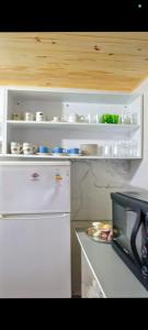 Η κουζίνα ή μικρή κουζίνα στο La casita del fondo