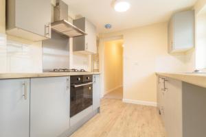 O bucătărie sau chicinetă la CityLink House +11 fotografii