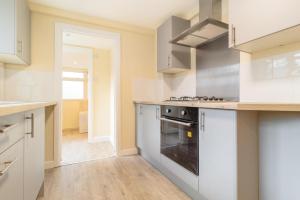 O bucătărie sau chicinetă la CityLink House