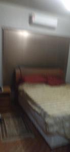 a bedroom with two beds and a window in it at Estância do atash in Santa Leopoldina