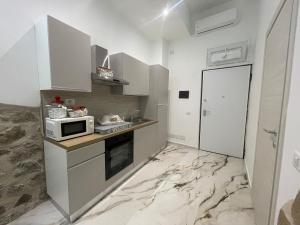 Køkken eller tekøkken på LETIZIA'S HOME Caserta + 12 billeder