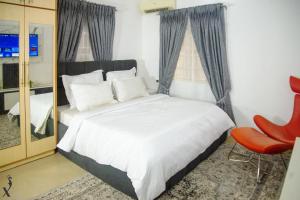 Ένα ή περισσότερα κρεβάτια σε δωμάτιο στο P- Deluxe Luxury Apartment