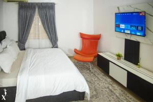 Μια τηλεόραση ή/και κέντρο ψυχαγωγίας στο P- Deluxe Luxury Apartment