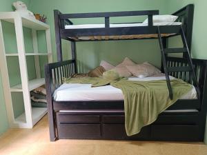 Ένα ή περισσότερα κρεβάτια σε δωμάτιο στο Open House Timboré