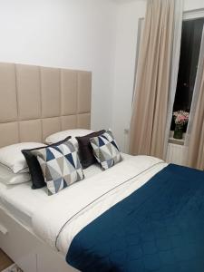 Ένα ή περισσότερα κρεβάτια σε δωμάτιο στο Bright and quiet apartment in Zeist Centrum