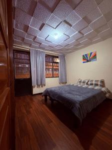 Postel nebo postele na pokoji v ubytování Aquisito Nomas Es