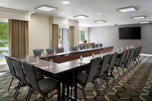 a large conference room with a long table and chairs at Sonesta ES Suites Atlanta Alpharetta Windward in Alpharetta +24 photos