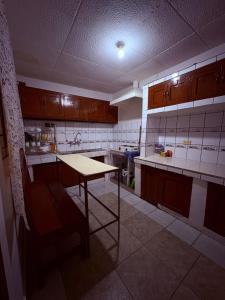 Kuchyň nebo kuchyňský kout v ubytování Aquisito Nomas Es