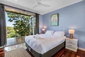 Ένα ή περισσότερα κρεβάτια σε δωμάτιο στο Cylinder Palms