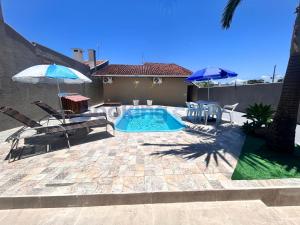 Πισίνα στο ή κοντά στο Recanto da Palmeira - Piscina aquecida, quartos com ar condicionado